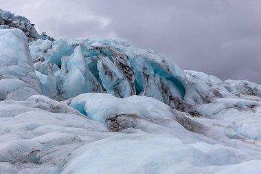 Skaftafell Glacier landscape, part of Vatnajokull National Park, Iceland. Blue glacier ice with cracks and crevasses.