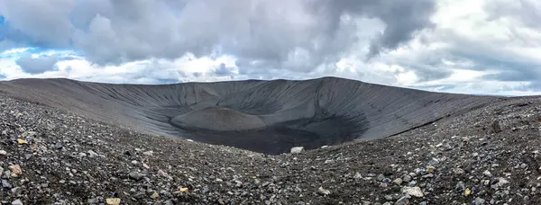 stock image Hverfjall explosion volcano cone, panorama of tephra cone (tuff ring volcano) in northern Iceland with black volcanic rocks.