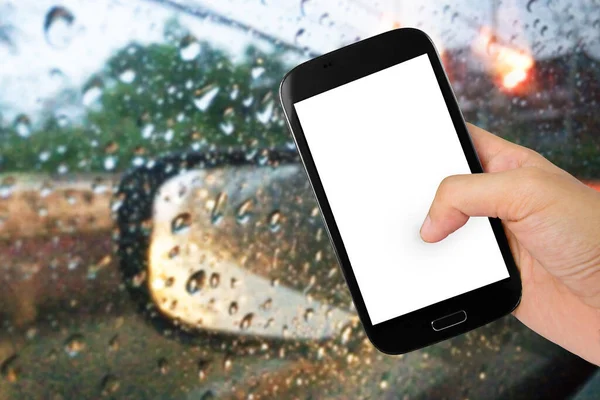 Hand Holding Smart Phone Raining Drops Car Window — Fotografia de Stock