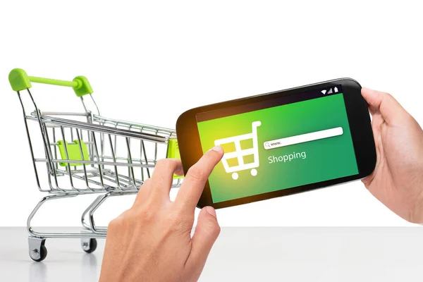 Hand holding mobile phone with shopping cart  at supermarket checkout background, e coupon concept