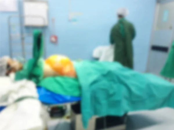 Motion blur with Medical  performing surgery on a girl cesarean in hospital. Medical  in operating room.
