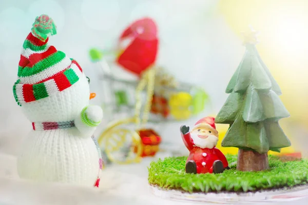 Santa Claus and Christmas gift Signs of Christmas toy souvenir with colour of bokeh background.