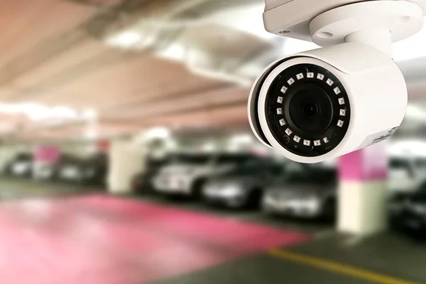 Security CCTV camera in office building installed indoor car par