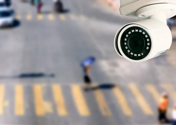 CCTV camera pointing on the road blurred background. artificial intelligence . secutity concept .