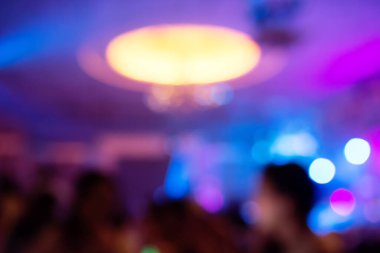 Blur people eating ,drinking and talking in dining room or hotel with colorfull of bokeh background, party concept.