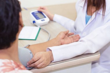 Doctor Checking blood pressure - close up