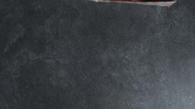 a box with six donuts cakes appears on a dark background