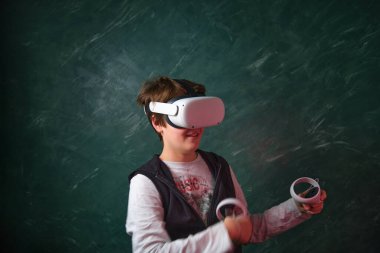 a boy playing with virtual reality glasses