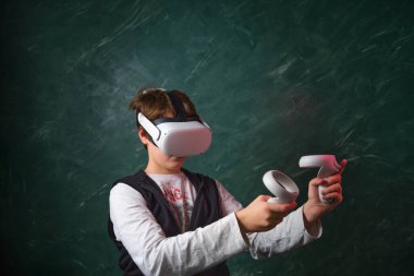 a boy playing with virtual reality glasses