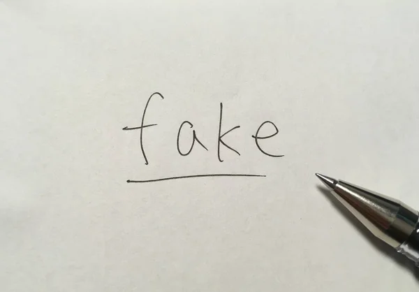 Fake Concept Woord Papier Achtergrond — Stockfoto