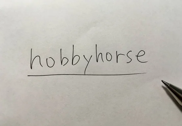 Hobbyhorse Conceito Palavra Sobre Fundo Papel — Fotografia de Stock