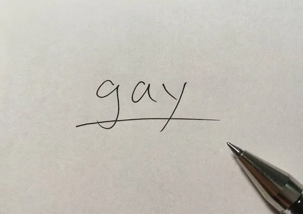 在纸的背景上写同性恋概念词 — 图库照片