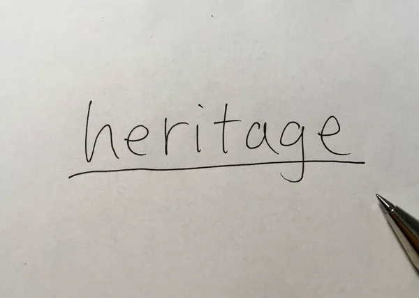 Heritage Konzept Wort Auf Papier Hintergrund — Stockfoto