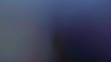 Pürüzsüz gradyan bulanık soyut holografik hareket arkaplanı.