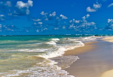 Punta Cana, Dominik Cumhuriyeti 'ndeki Bavaro plajından günlük sahne.