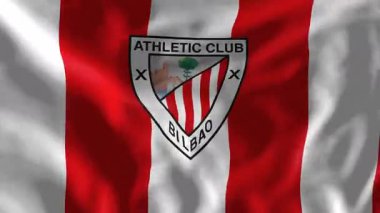 Bilbao, İspanya - 4 Haziran 2025: Atletizm Kulübü Bilbao armalı bayrak yavaş çekimde sallanıyor. Gerçekçi 3D animasyon, kusursuz bir şekilde dönüyor..