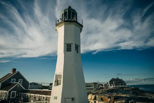 stock image Scituate Harbor lighthouse overlooks a breakwater in Massachusetts - oct, 2022. High quality photo