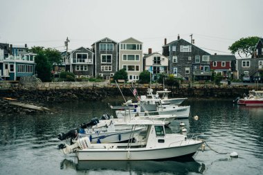 Rockport, MA, USA - oct, 2022 Dinghies and working lobster boats populate Rockport, Massachusetts Harbor. High quality photo clipart