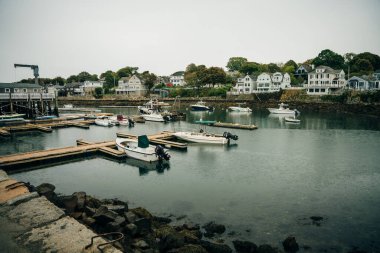 Rockport, MA, USA - oct, 2022 Dinghies and working lobster boats populate Rockport, Massachusetts Harbor. High quality photo clipart