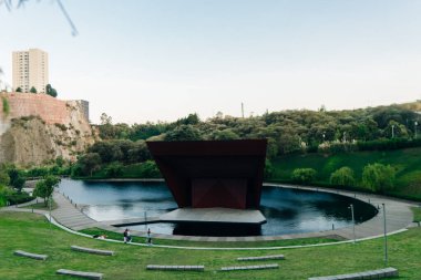 La Mexicana, Santa Fe, Mexico City - april 2023, modern urban park with articicial lake and red auditorium. High quality photo clipart