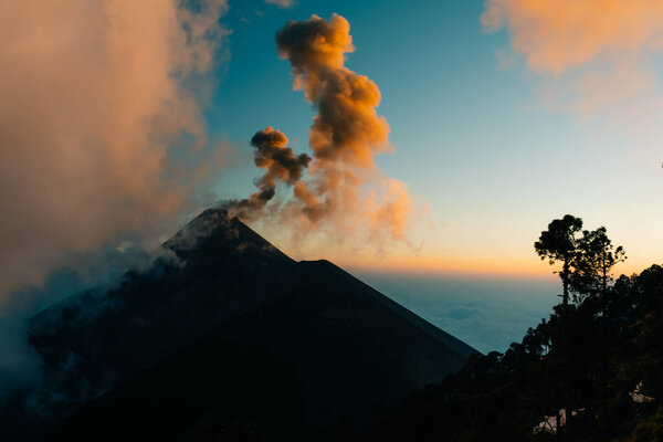 Volcano Fuego erupting at night from view of Volcano Acatenango, Guatemala. High quality photo