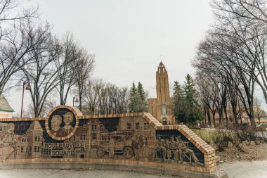 Rouleauville Square Wall and the tower of St Mary s Cathedral in Calgary, Alberta, Canada - may 2023. High quality photo clipart