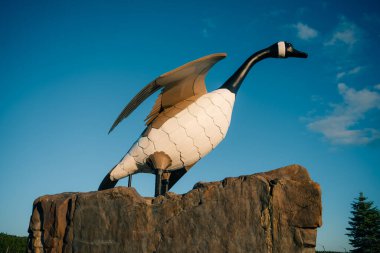Wawa, Ontario, Canada - Sep 1, 2022 The larger-than-life statue of the Wawa Goose overlooks. High quality photo clipart