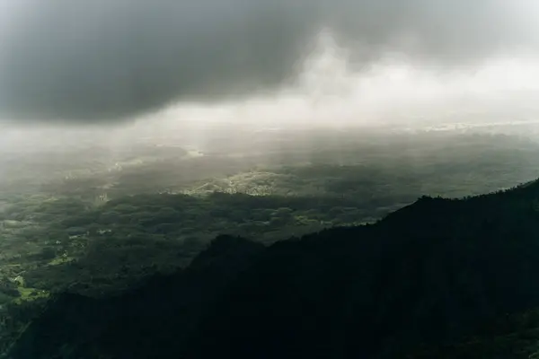 stock image Clouds swirling around mountains of kauai as seen from helicopter. High quality photo