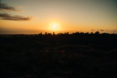 sunset on Kekaha Lookout in kauai, hawaii. High quality photo clipart