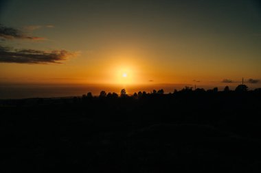 sunset on Kekaha Lookout in kauai, hawaii. High quality photo clipart