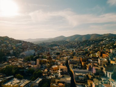 Aerial hyperlapse over the beautiful magical town of Guanajuato with a special sunset . High quality photo clipart