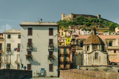 Italy, Bosa, may 1, 2024 old beautiful italian street with colorful houses. High quality photo clipart