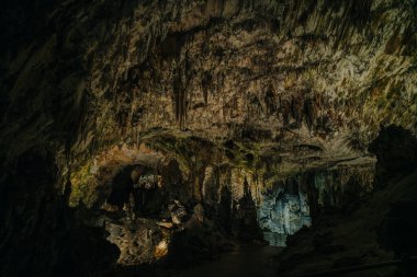 Landscape View Of The Beautiful And Amazing Stalactites On The Trails Of Postojna Cave Park, Postojna , Slovenia. High quality photo clipart