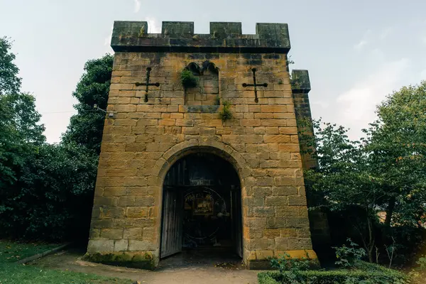 stock image ALNWICK, NORTHUMBERLAND, ENGLAND, UK - SEPTEMBER 2023 Alnwick Garden - entrance into the poison garden. High quality photo