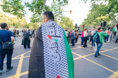 barcelona, spain - 7 May 2024: Attending a peaceful demonstration defending Palestine. High quality photo clipart