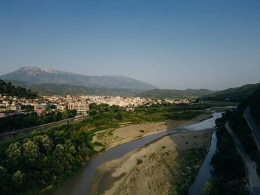 BERAT, ALBANIA, April 13, 2024: Berat castle viewed from boulevard Republika in Albania. High quality photo clipart