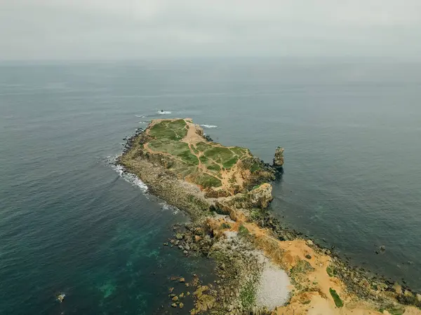 stock image Rock formations of the Papoa island in the site of geological interest of the cliffs of the Peniche peninsula, portugal. High quality photo