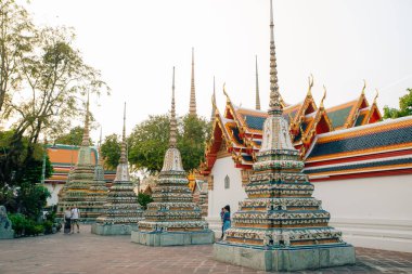 View of Wat Arun Ratchawararam Buddhist temple, Bangkok, Thailand. High quality photo clipart