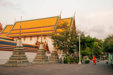 View of Wat Arun Ratchawararam Buddhist temple, Bangkok, Thailand. High quality photo clipart