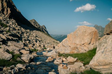 Mountain lakes in Posets Maladeta national park, Vielha valley in Spanish Pyrenees, GR11 hiking trail, Europe. High quality photo clipart