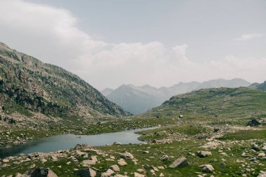 Mountain lakes in Posets Maladeta national park, Vielha valley in Spanish Pyrenees, GR11 hiking trail, Europe. High quality photo clipart