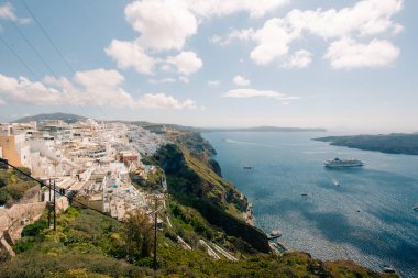 Early morning view of bay on Santorini island, Greece. the luxury cruise ships in the bay. High quality photo clipart