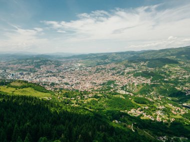 A captivating aerial view of Sarajevo's cityscape nestled amidst the scenic hills of Bosnia and Herzegovina. High quality photo clipart