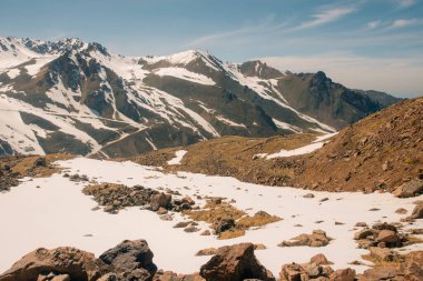 Amazing mountain morning view with rocks and ice in Tian Shan mountains in Central Asia near Almaty in cloudy weather. High quality photo clipart