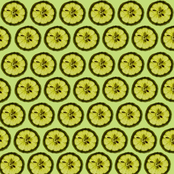 Свежие Ломтики Лимона Светло Зеленом Фоне Образующие Красивый Фон Текстуры — стоковое фото