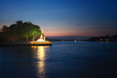 Pak Kret Lean Pagoda. Mon stupa rim Chao Phraya River or pagoda leaning or Tilted Pagoda of Wat Paramaiyikawat Worawihan temple at Pak kret city in Nonthaburi, Thailand
