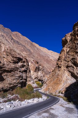 Scenic road in Himalayas near pass. Ladakh, India. Rural roads in Leh, Ladakh. clipart