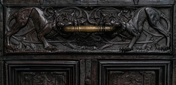 Old gothic bronze door handle