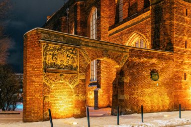 Ancient gothic church at winter night. Peter and Paul Church in Gdansk