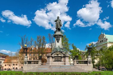 Warsaw, Poland - May 01, 2023: Monument to Adam Mickiewiczin the Krakow suburb of Warsaw, 1898. The authors are the sculptor Cyprian Godebskyi, architects Jozef Pius Dzekonskyi and Vladyslav Marconi
